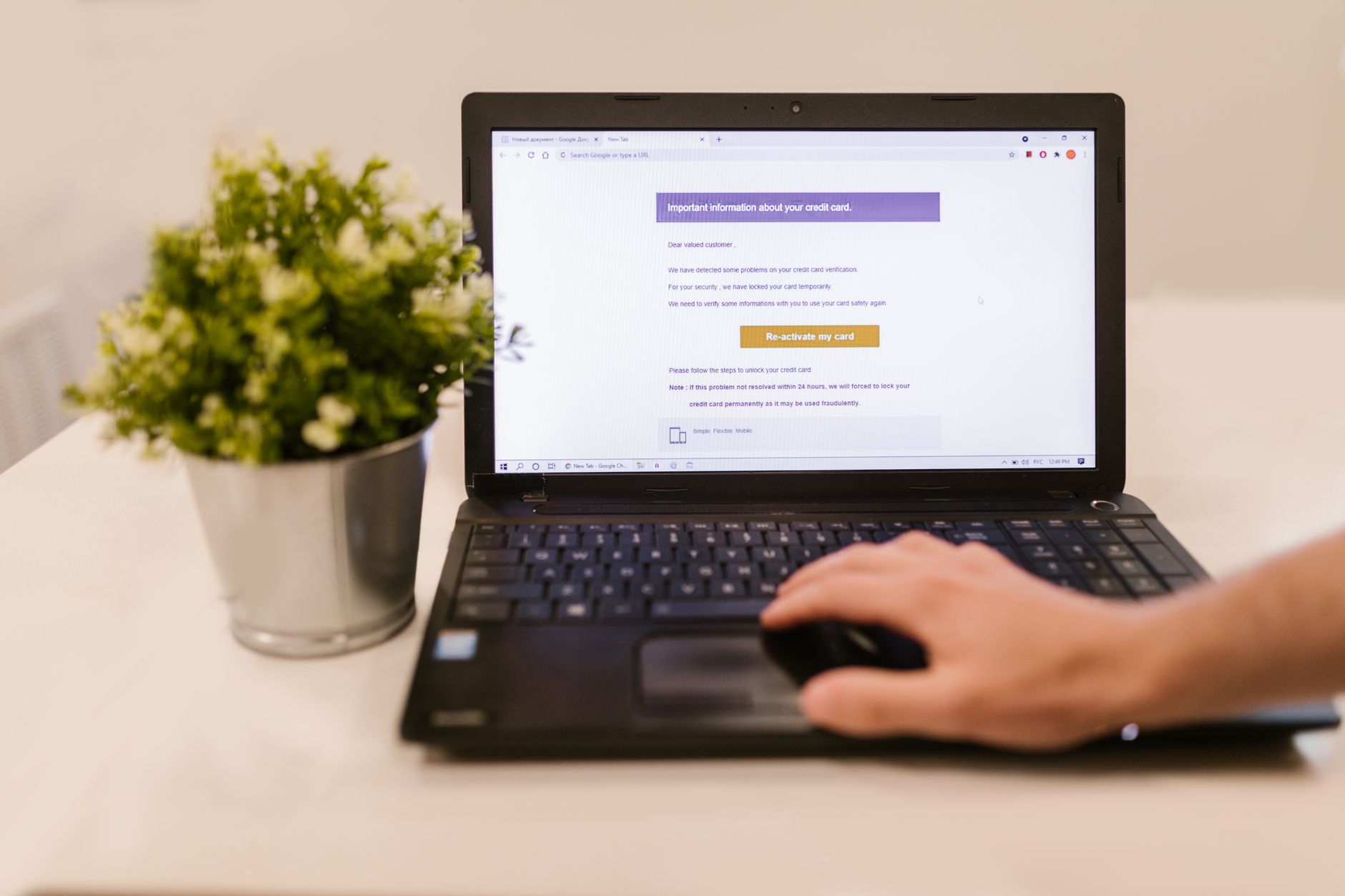 A retail investor uses a laptop to complete an online questionnaire about complex trading products.