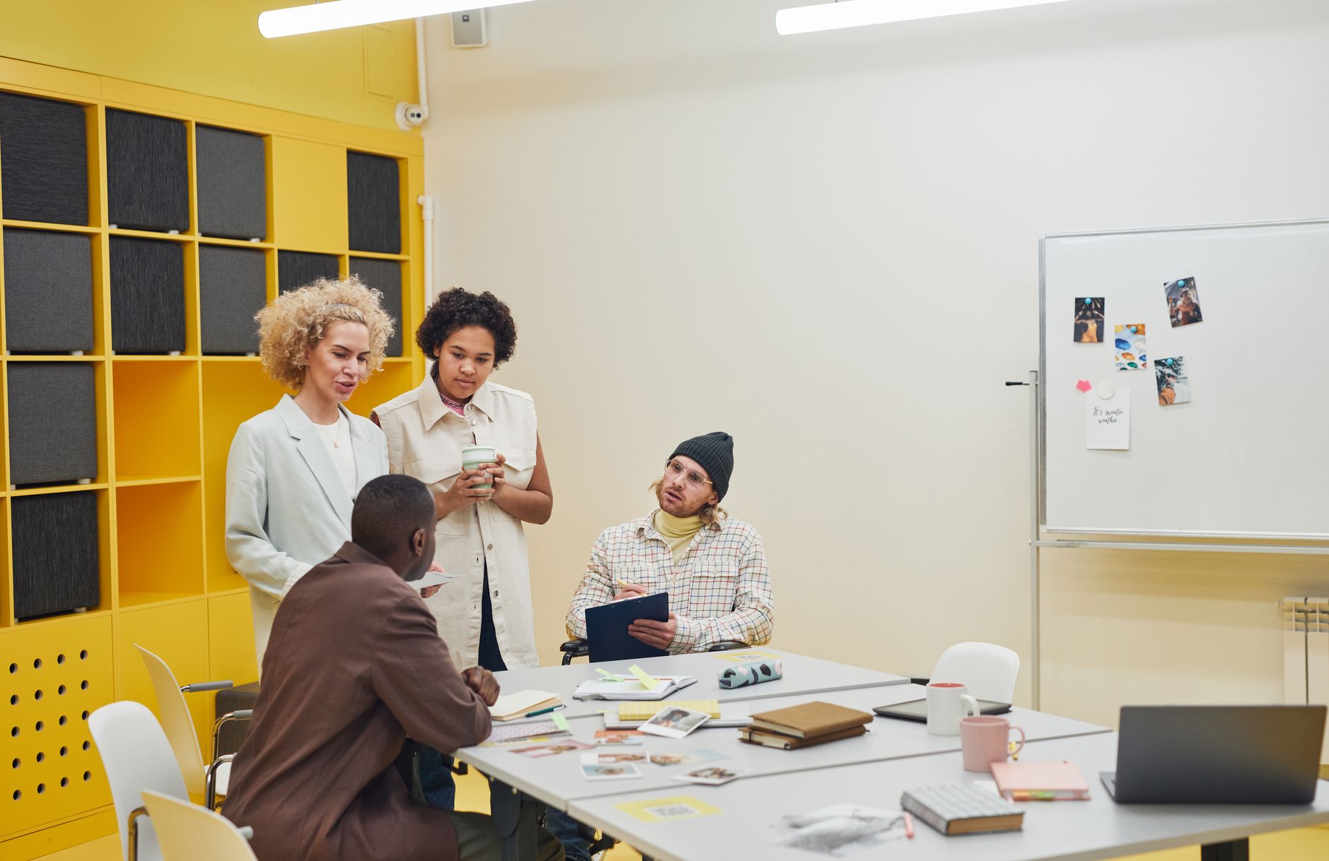Executives at an office meeting, illustrating HFM's appointment of Evagoras Kountouris as chief of staff.