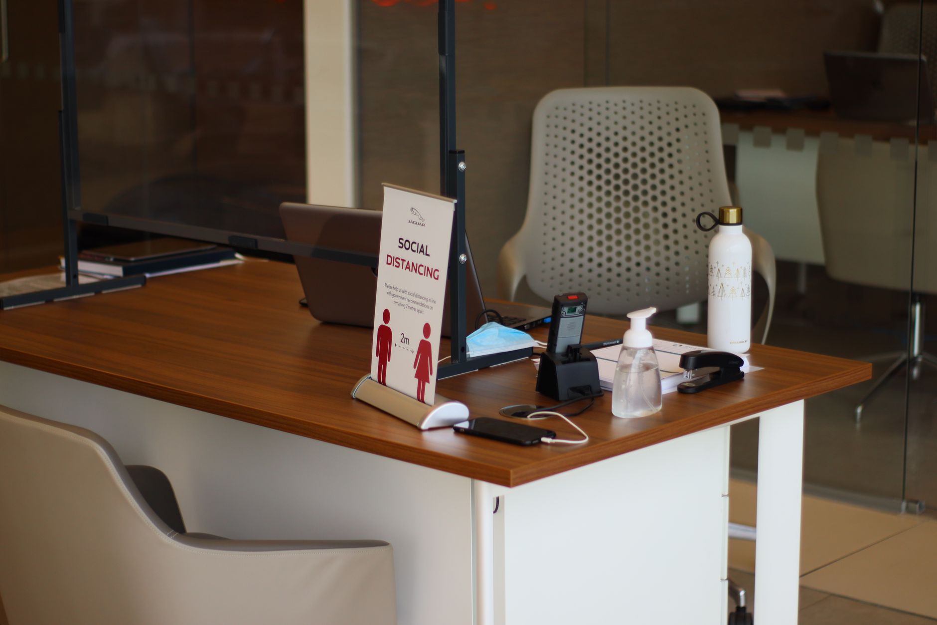 Compliance paperwork and a calculator on a desk, illustrating regulatory action over Trive client accounts.