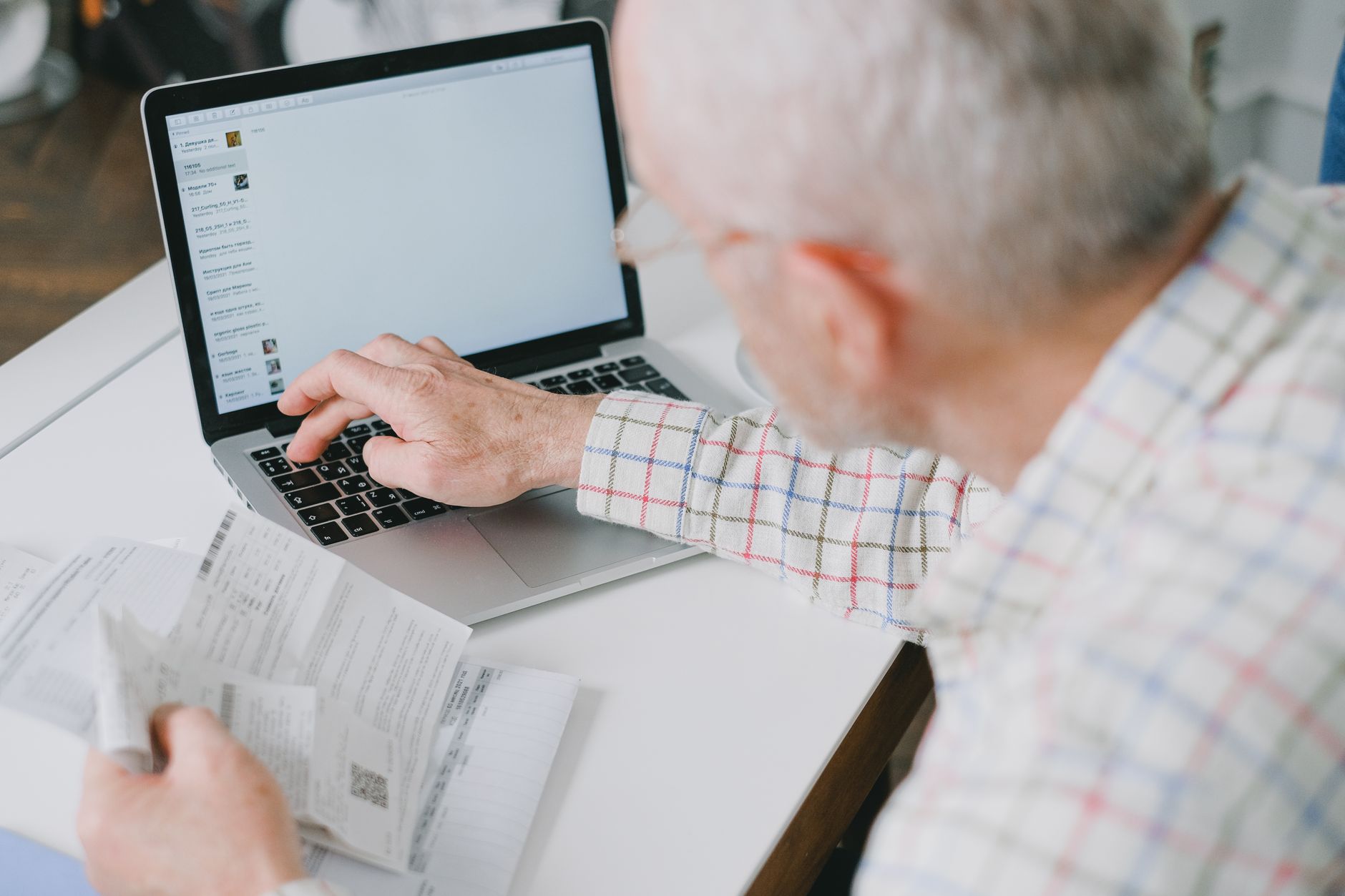A person reviewing a retirement investment account on a laptop